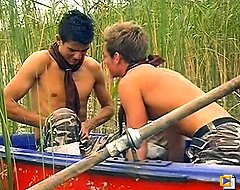 Steamy gay fucking in a little boat